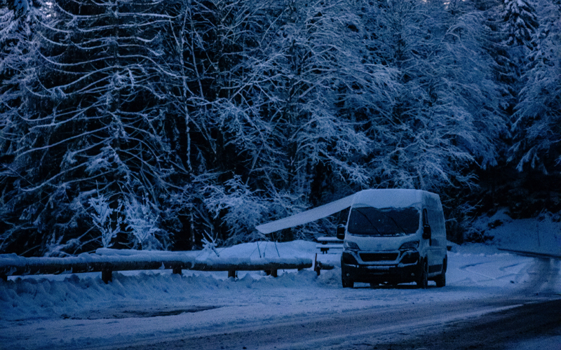 Large van driving in the snow