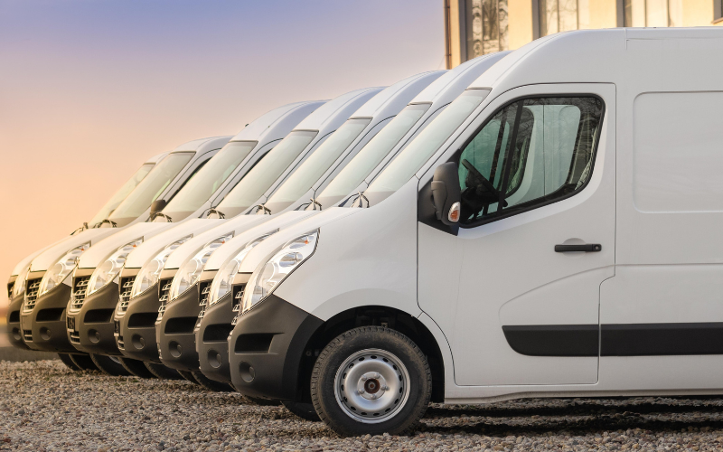 Fleet of white vans lined up